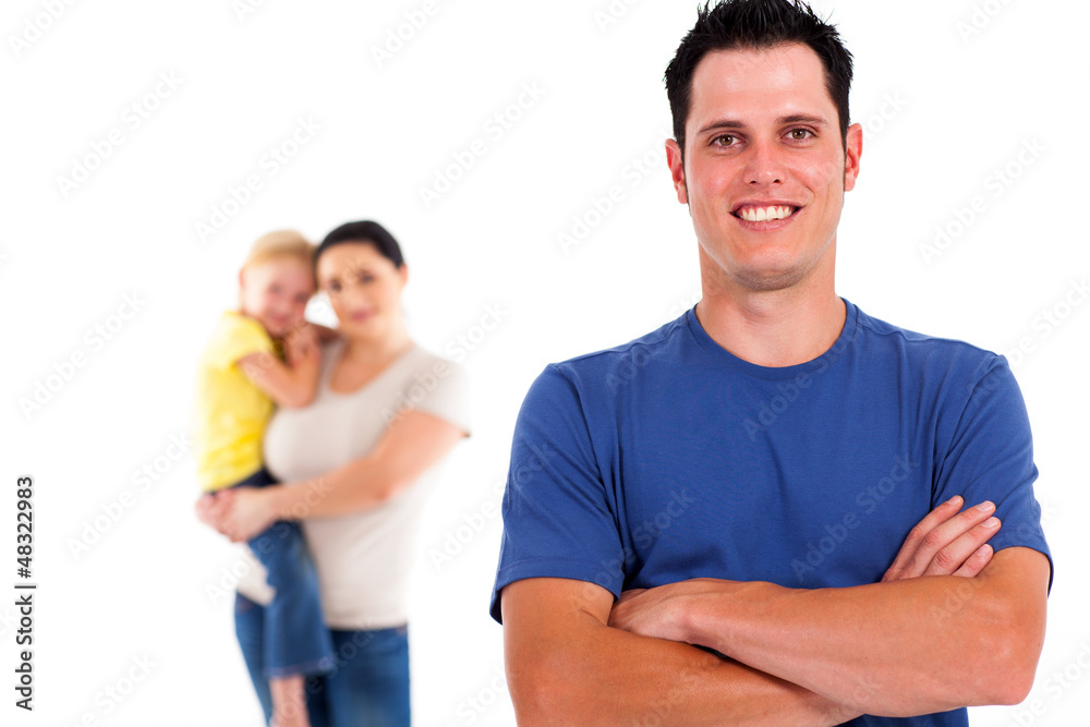 father standing in front of family father standing in front of family