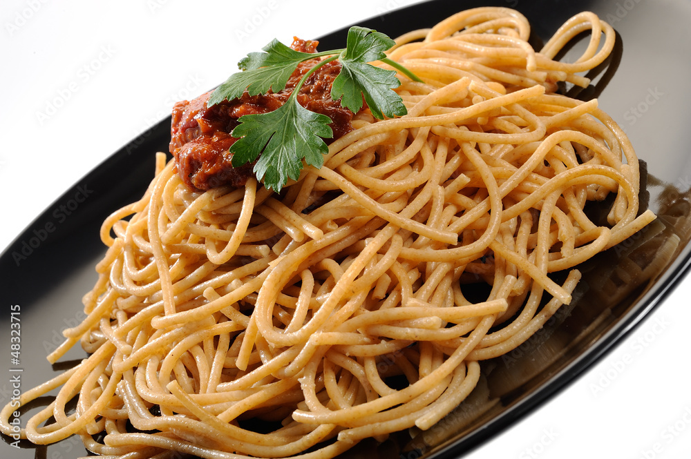 Spaghetti with sauce on a white background Spaghetti with sauce on a white background