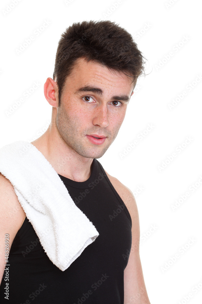Obraz premium Healthy young man with towel isolated