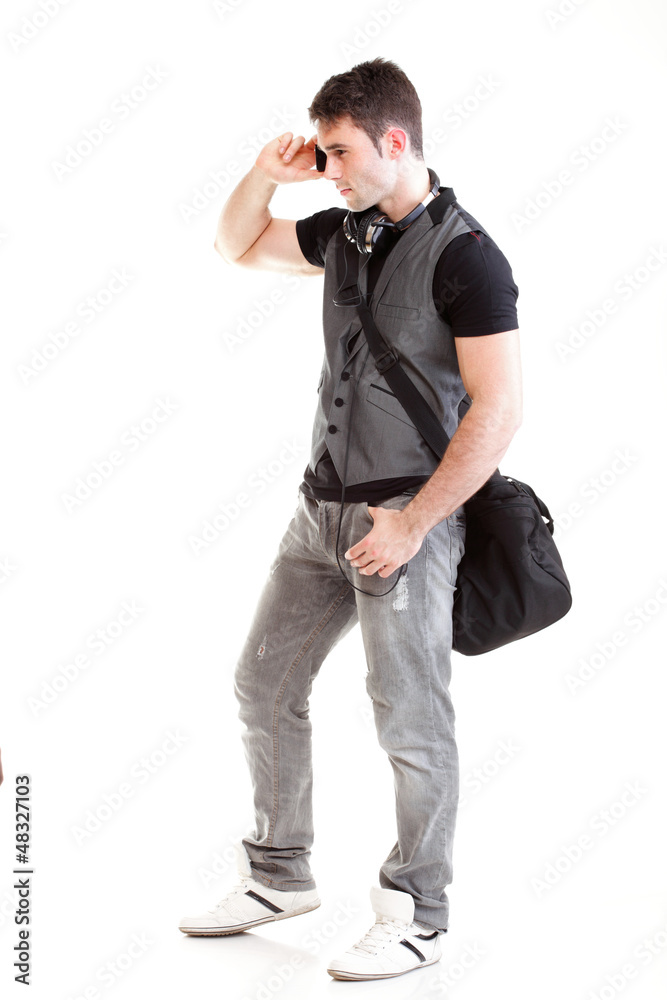 Full length portrait school boy talking phone Full length portrait school boy talking phone