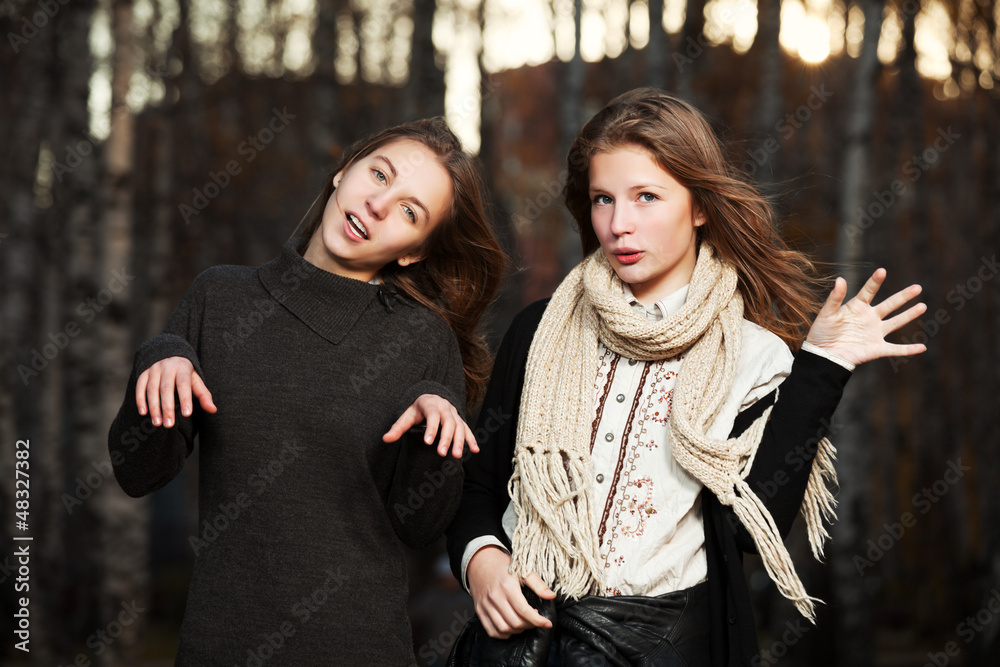Young girls in an autumn park