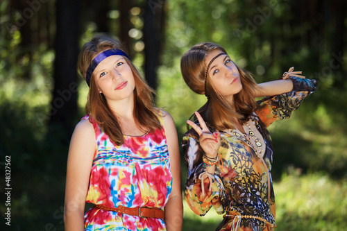 Happy young girls in a forest