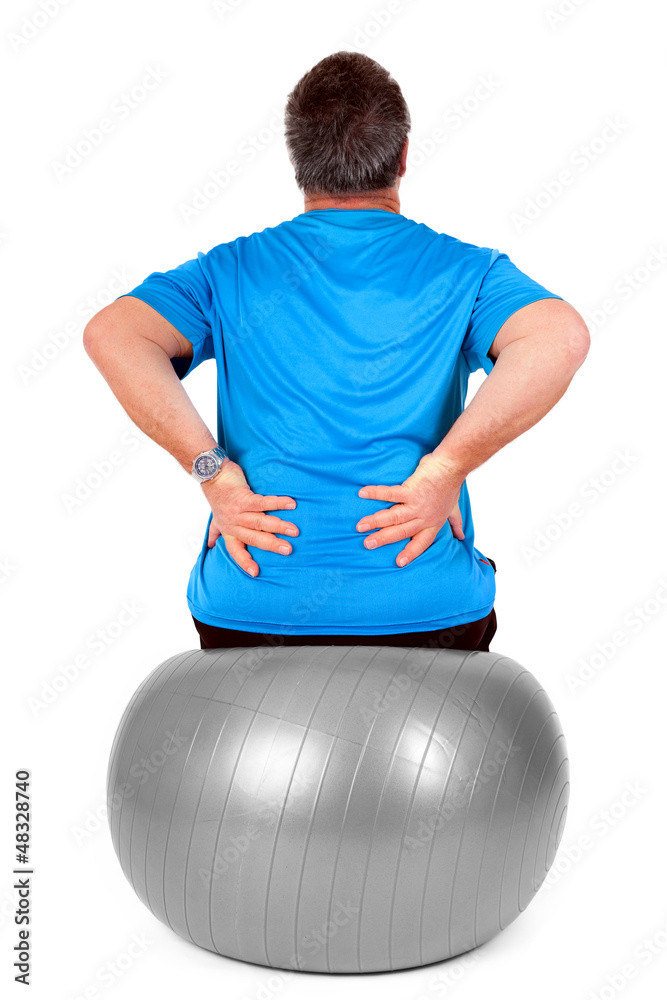 Obraz premium Man with exercise ball