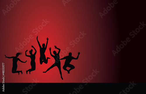 group jumping on a red background