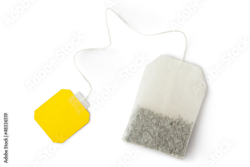 Teabag with yellow label. Top view.