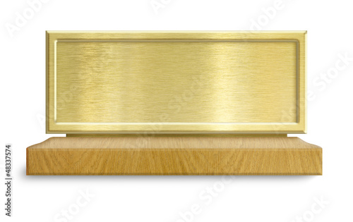 Golden metal frame on woode...