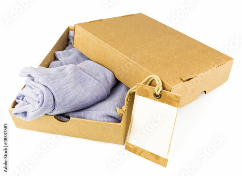 Clothes in open carton