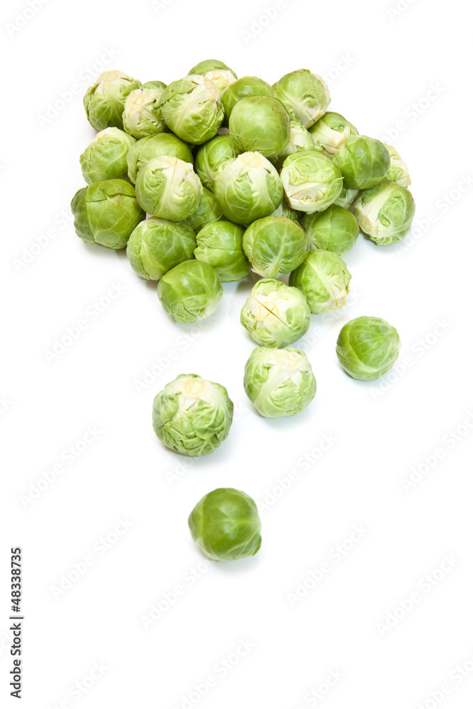 Brussel sprouts isolated on a white studio background. Brussel sprouts isolated on a white studio background.