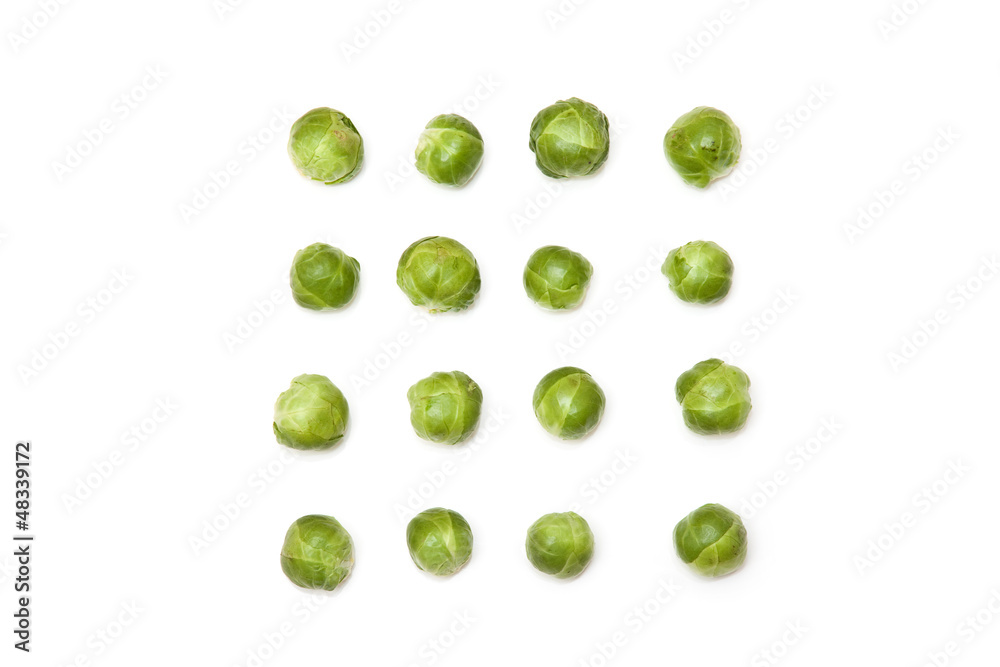Brussel sprouts isolated on a white studio background. Brussel sprouts isolated on a white studio background.