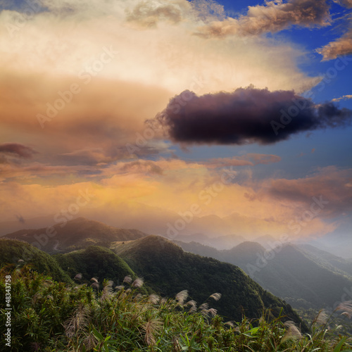 Amazing sunrise and mountain of cloud with mountains and tree