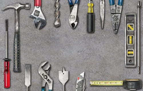 Group of used tools on concrete