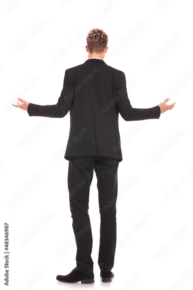 full body back view of a business man welcoming full body back view of a business man welcoming