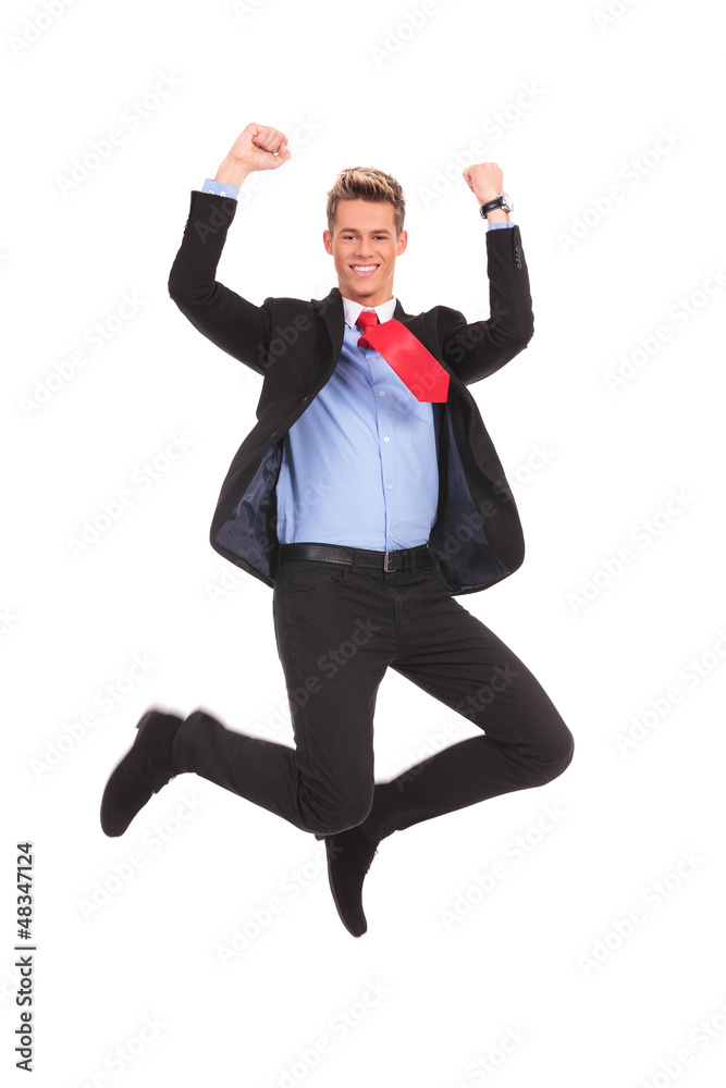 happy businessman jumping in air