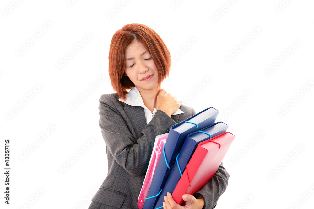 肩こりを訴えるオフィスレディー