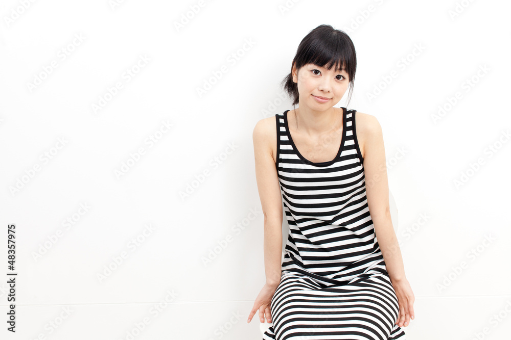 a young asian woman relaxing a young asian woman relaxing