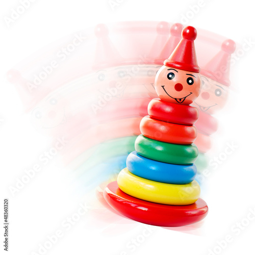 Fotografia Wooden Pyramid Tumbler Toy Isolated on a White