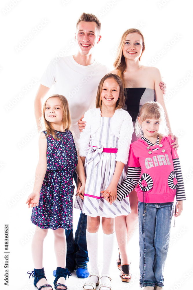 Obraz premium Happy family of parents and young children