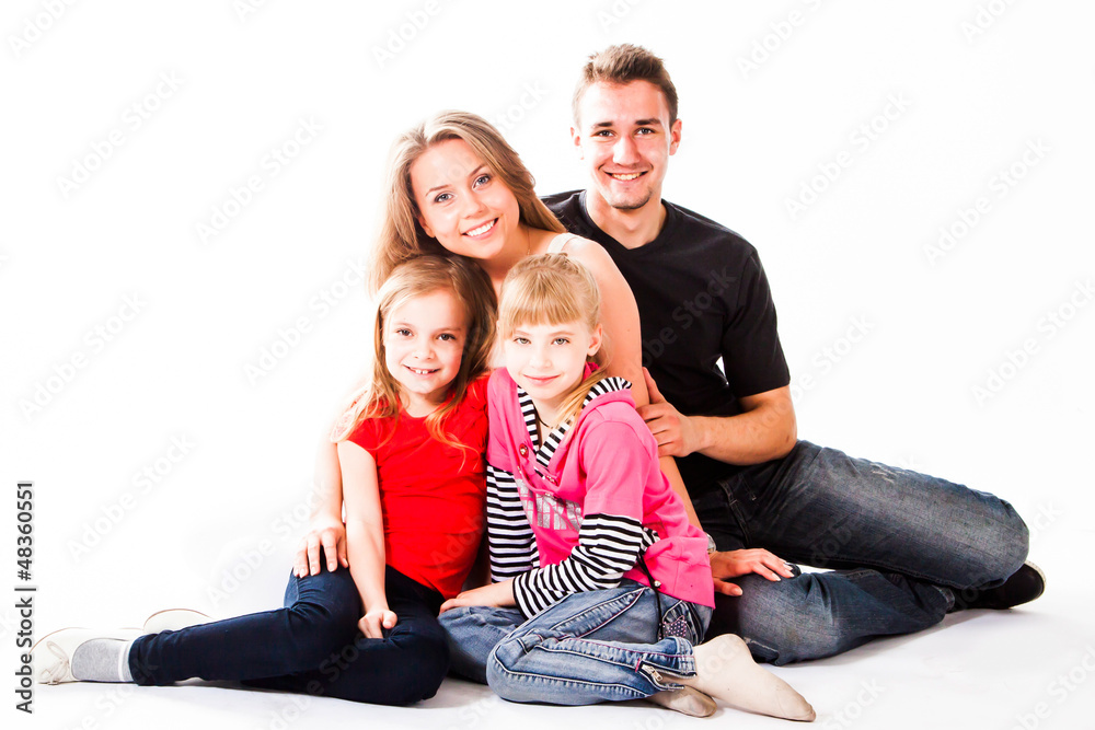 Happy family of parents and young children Happy family of parents and young children