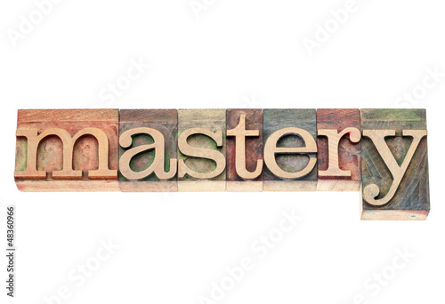 фотографія mastery word in wood  type