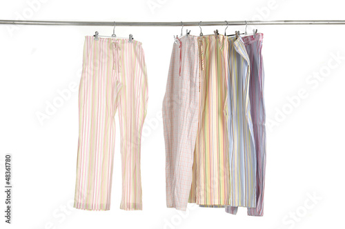 female dress shirt and trousers clothespins on rope