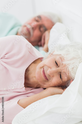 Elderly couple asleep