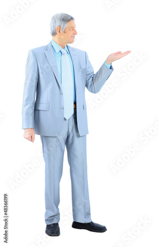 Businessman in age, with an outstretched hand.