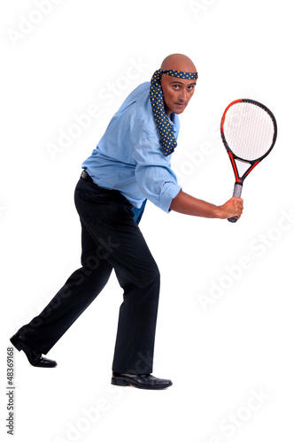 business man playing tennis