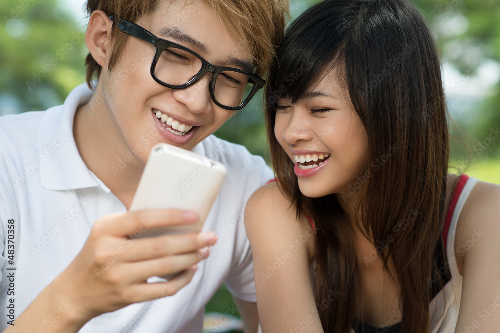 Teens with gadget Teens with gadget