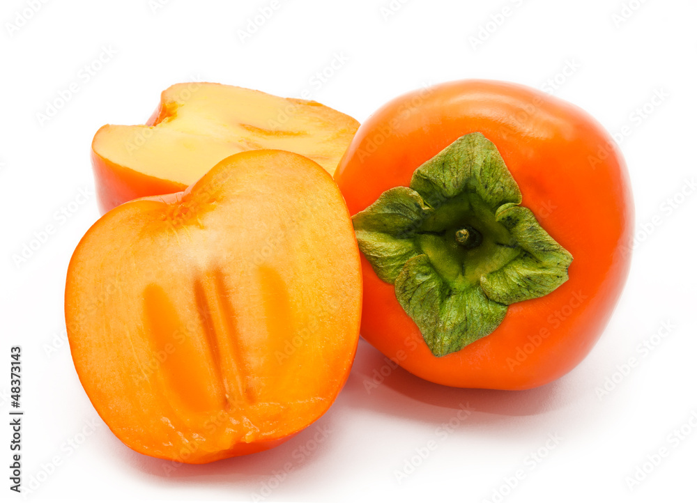 Orange ripe persimmon isolated on white