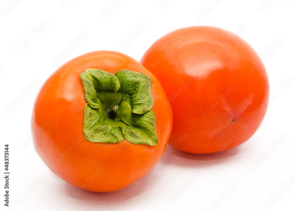 Two orange ripe persimmon isolated Two orange ripe persimmon isolated