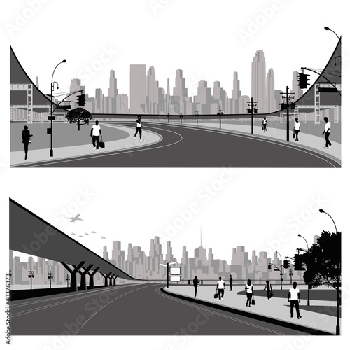 Crowd of people walking on a  city street.Highway silhouette