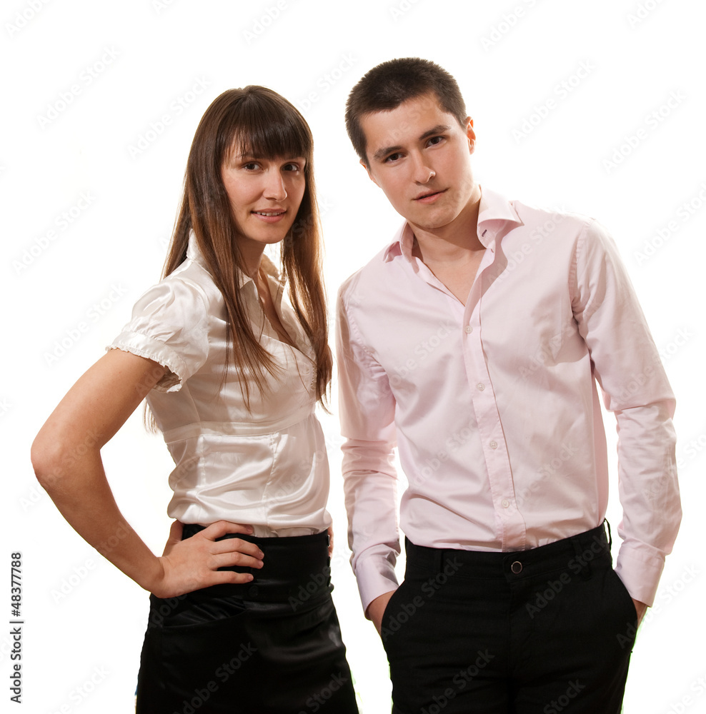 Business couple smiling isolated over a white background Business couple smiling isolated over a white background