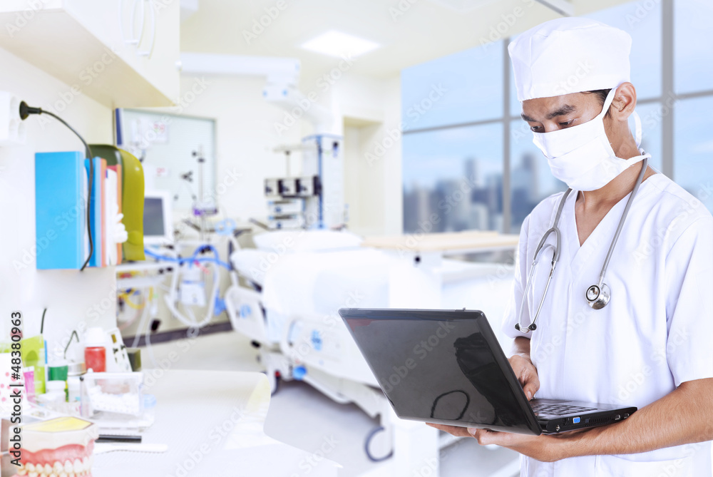 Doctor working with laptop Doctor working with laptop
