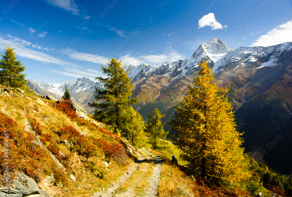 Bietschorn mountain peak in autumn with hiking trail - obrazy, fototapety, plakaty 