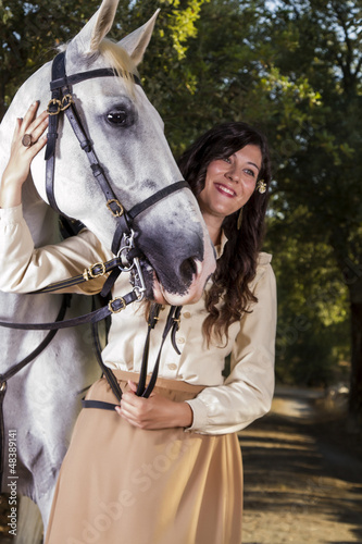 Fototapeta Naklejka Na Ścianę i Meble -  classical girl with a white horse