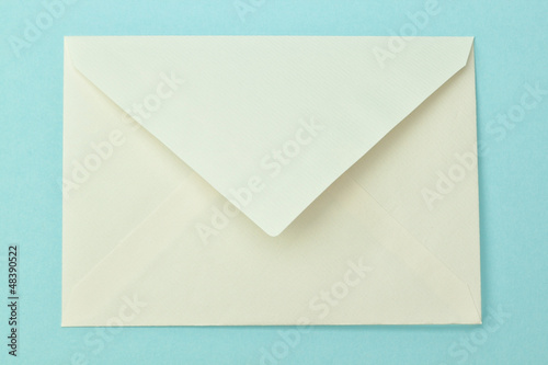 Simple postal envelope on a blue background.