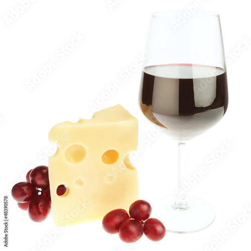 The composition of snacks of cheese, wine and grapes. On a white