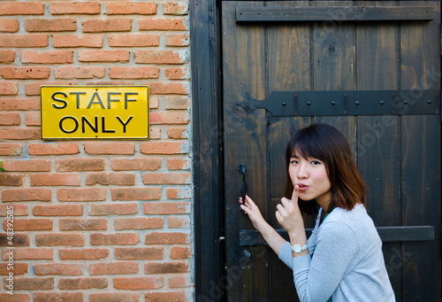 Cute Thai woman is sneaking the secret area photo