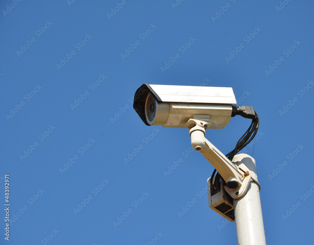 IR surveillance camera against blue sky IR surveillance camera against blue sky