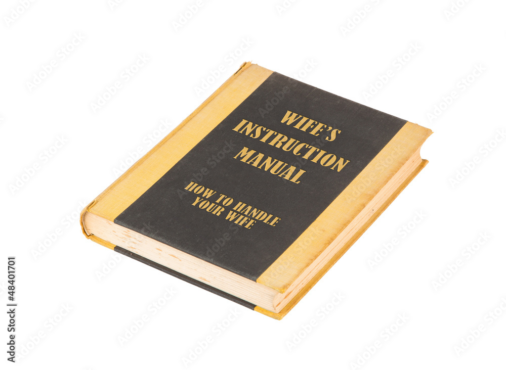 Old book with a wifes instructional manual concept title Old book with a wifes instructional manual concept title