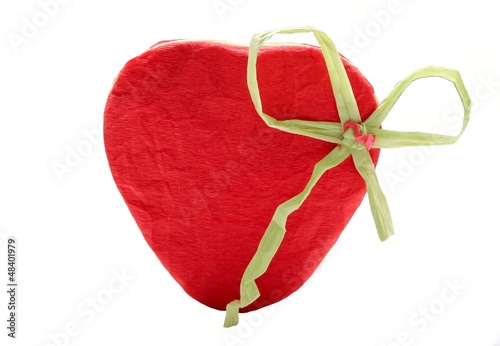 Red heart from wrinkled paper isolated on white
