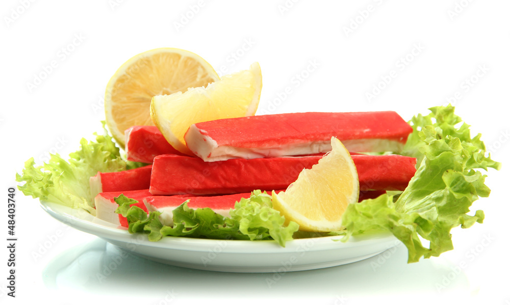 Crab sticks with lettuce leaves and lemon Crab sticks with lettuce leaves and lemon