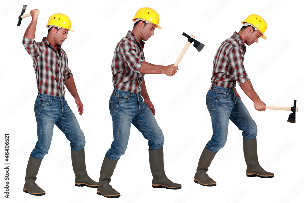 Man using hatchet Man using hatchet