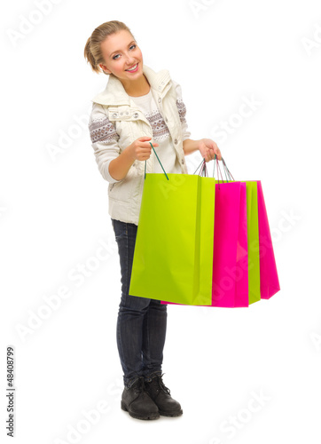 Young smiling girl with bags