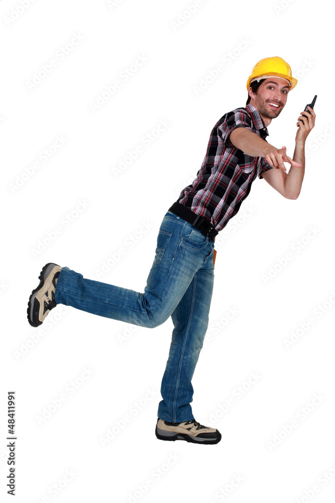 traffic controller using a walkie-talkieing on one fo traffic controller using a walkie-talkieing on one fo