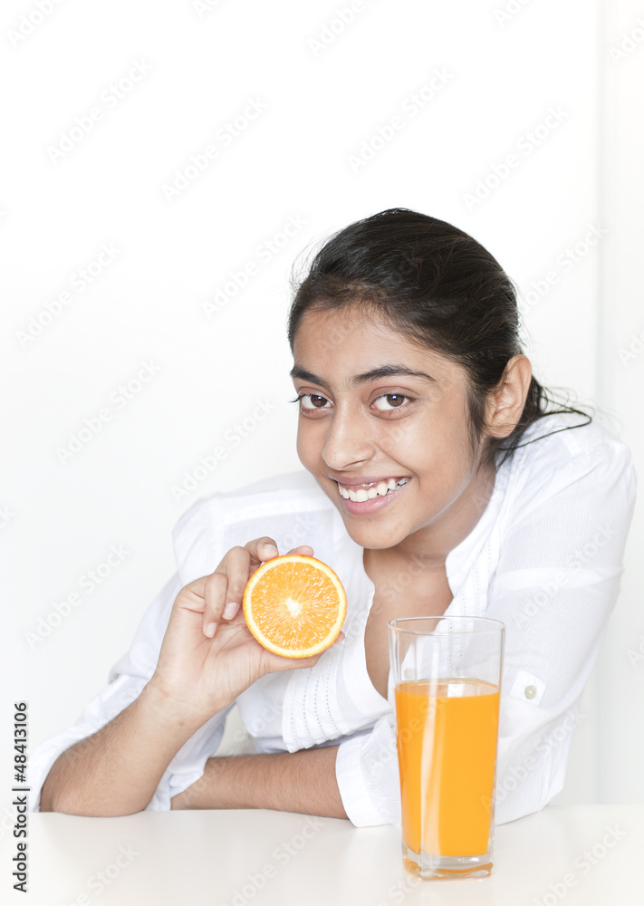 Pretty girl with fruits