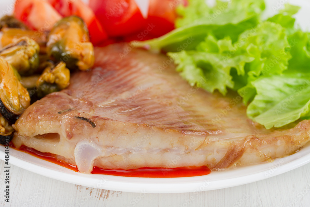 fried fish with mussels and fresh salad fried fish with mussels and fresh salad