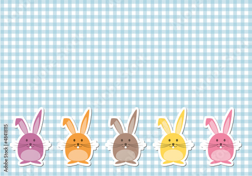 Bunte Osterhasen auf Karo-Hintergrund
