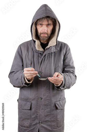 adult man uses intravenous drugs