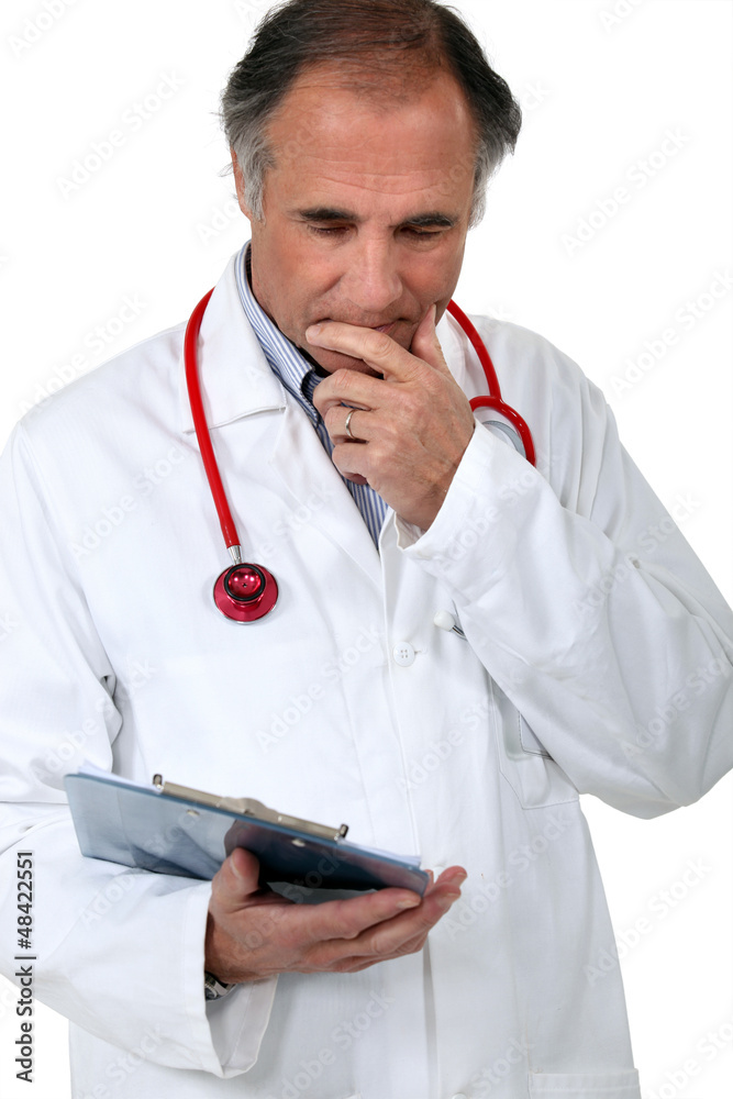 Doctor with a stethoscope and clipboard Doctor with a stethoscope and clipboard